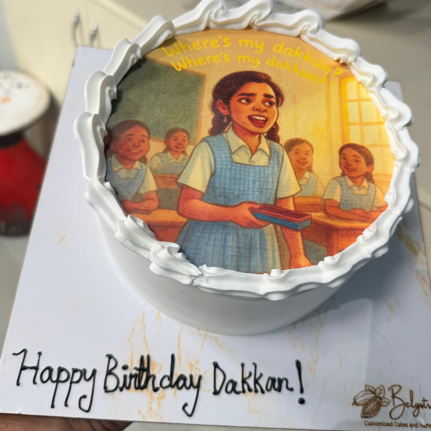 A high-resolution Belgstrew eggless photo cake featuring a vibrant edible family portrait and elegant border frosting.