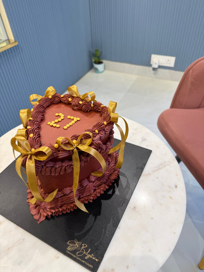 Heart-Shaped 2 Kg Hazelnut Praline Chocolate Cake with Golden Ribbons – Elegant Celebration Cake