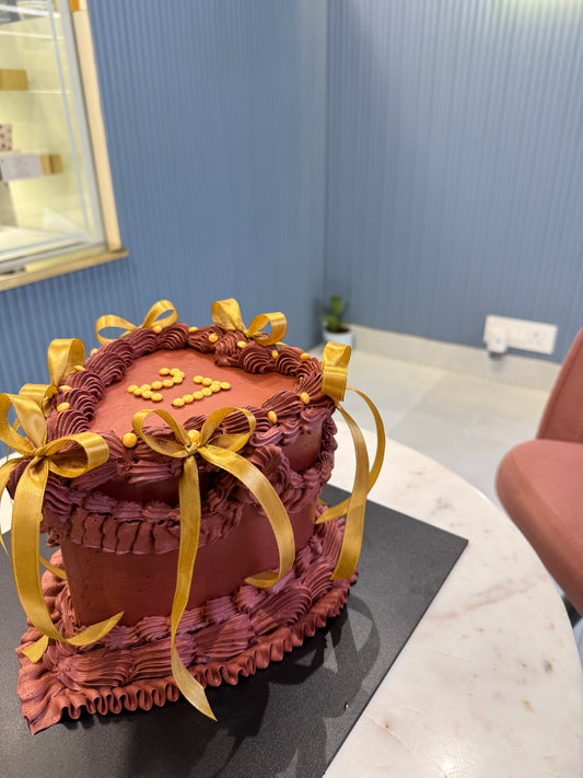 Heart-Shaped 2 Kg Hazelnut Praline Chocolate Cake with Golden Ribbons – Elegant Celebration Cake