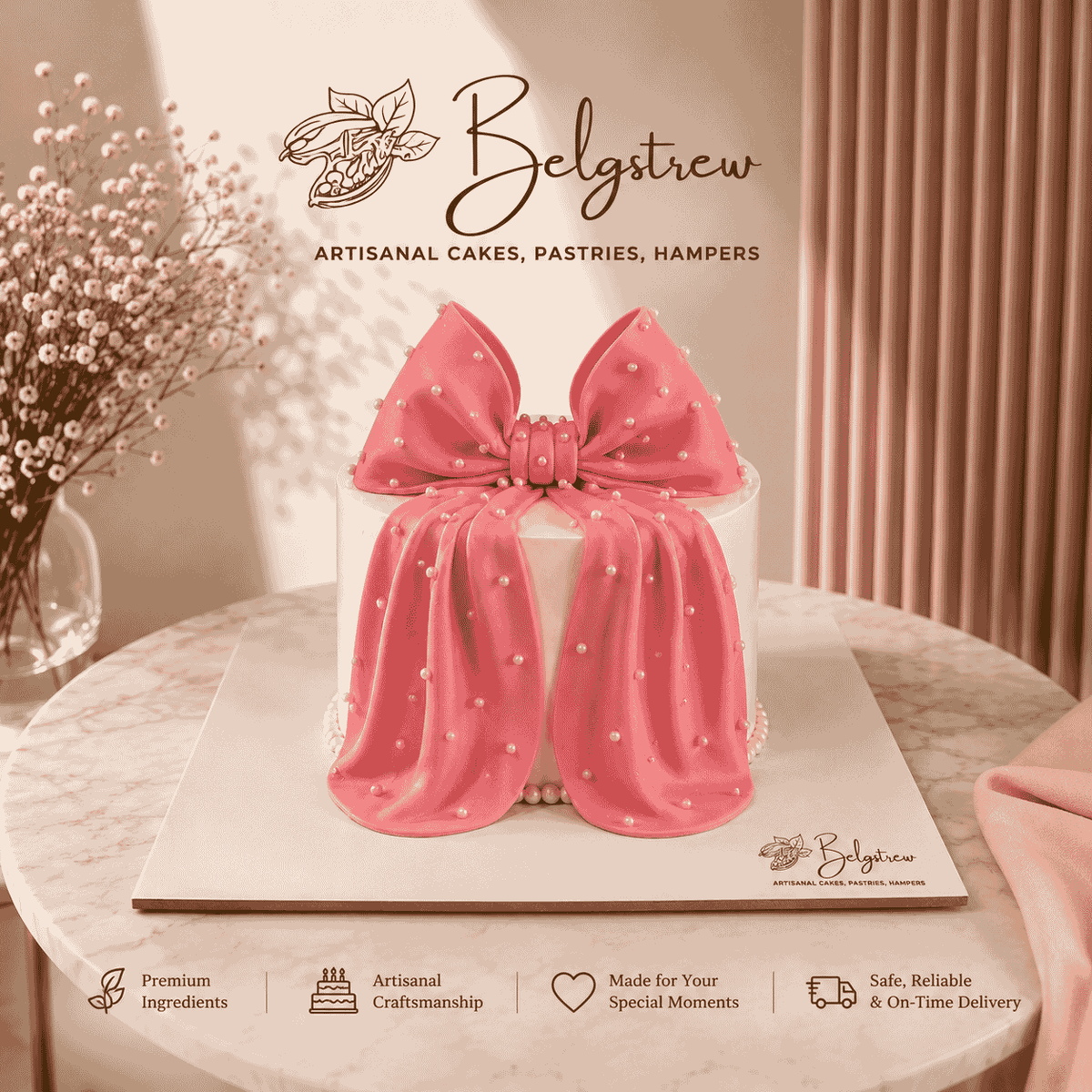 A tall round white frosted cake decorated with a large handcrafted pink bow studded with white sugar pearls draping down the front.